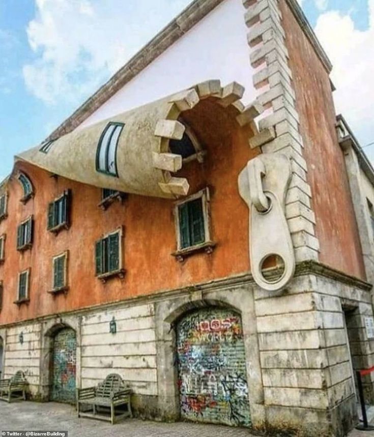The zipper on the side of a classic building in Milan was actually created as an art installation and advertisement by British artist Alex Chinneck for the city's fashion week in 2019