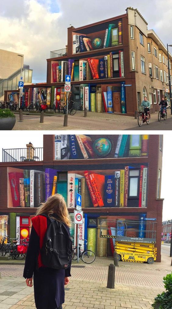Dutch Artists Transform a Utrecht Apartment Building into a Tri-Level Trompe L'Oeil Bookcase