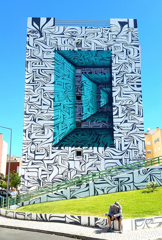 artist astro has realized a monumental outdoor mural for a public art initiative in the area.
